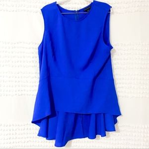 Royal blue ruffle peplum high low top